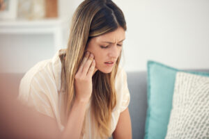 Woman in pain photo - Emergency Dentist